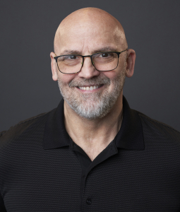 Voiceover actor in black polo shirt